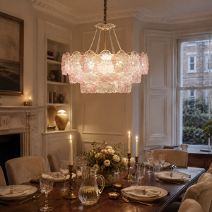glass pendant light beside a bright window