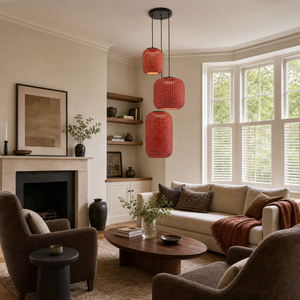 designer high-end handwoven multi-light pendant light above a bright dining table