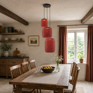 designer high-end handwoven multi-light pendant light beside a bright window