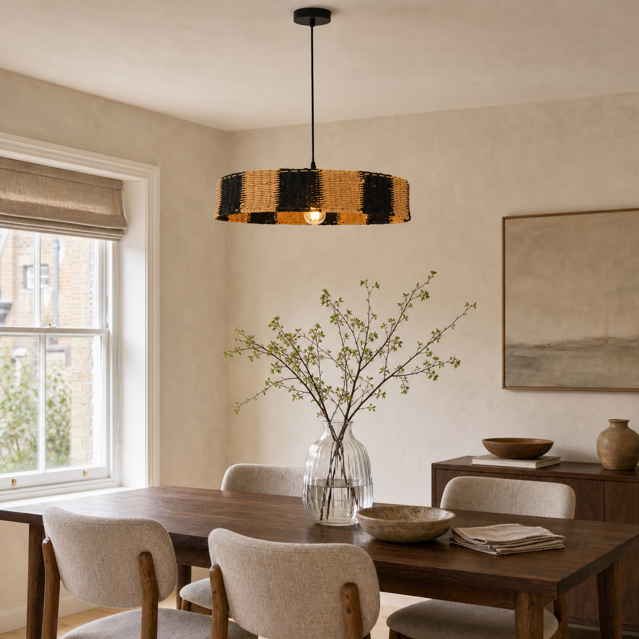 paper rope pendant light above a bright dining table