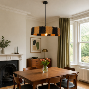 paper rope pendant light beside a bright window
