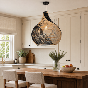 black rattan pendant light above a bright dining table