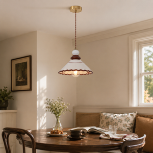 brown ceramic lace pendant light above a round dining table
