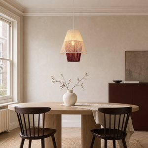 purple white paper rope pendant light above a bright dining table