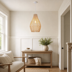 bamboo rattan pendant light above a bright dining table