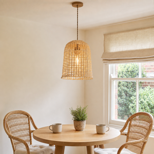 Natural bamboo pendant over a round breakfast table