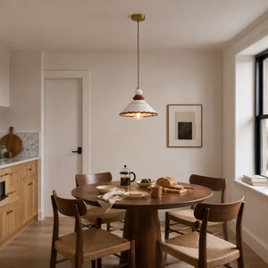 brown ceramic lace pendant light above a kitchen dining table