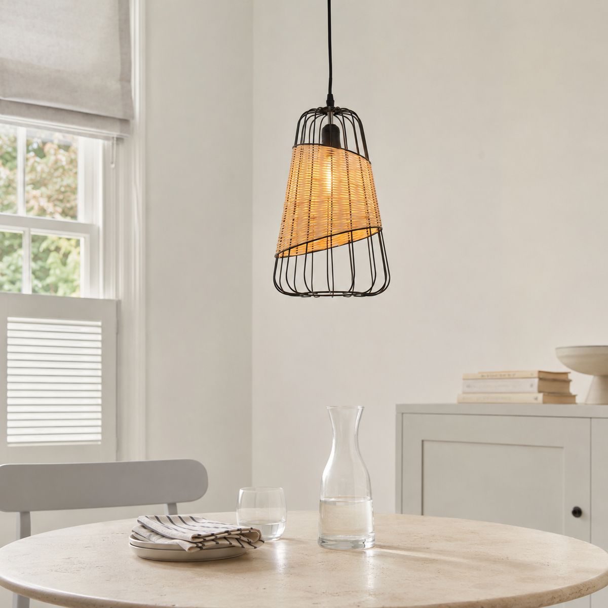rattan iron lantern pendant light over a warm kitchen counter
