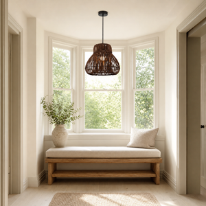 rattan pendant light beside a bright window