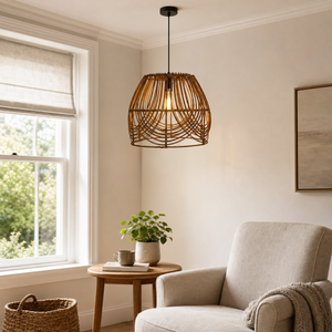 rattan pendant light above a bright dining table