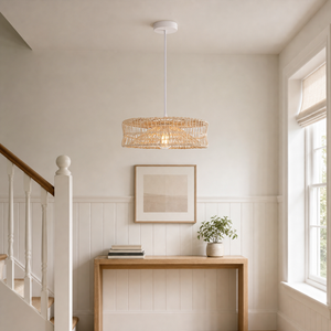 rattan pendant light beside a bright window