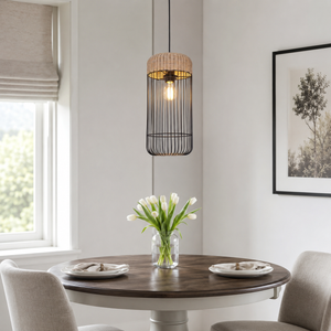 rattan iron cylinder pendant light above a bright dining table