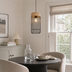 rattan iron cylinder pendant light over a warm kitchen counter