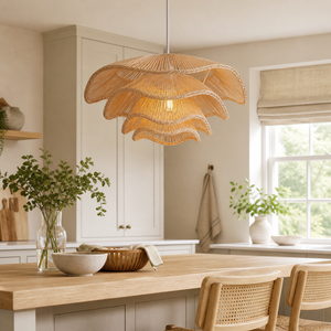 Multi-tiered rattan pendant over a bright kitchen table