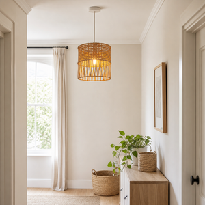rattan pendant light over a warm kitchen counter