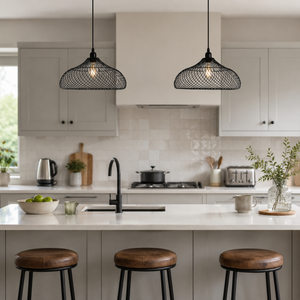 black iron pendant light beside a bright window