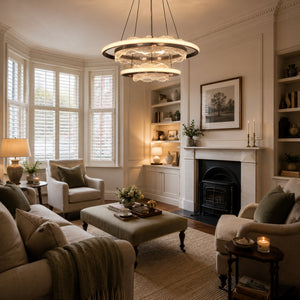aluminium pendant light above a bright dining table