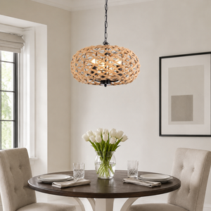 iron globe pendant light above a bright dining table