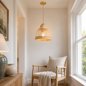 rattan pendant light beside a bright window