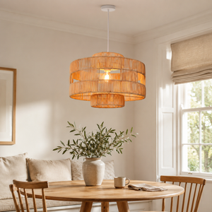 rattan pendant light in a sunlit breakfast nook
