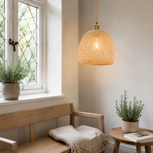 bamboo pendant light beside a bright window