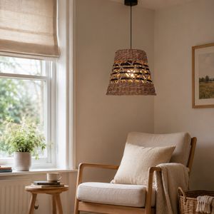 paper rope pendant light above a bright dining table