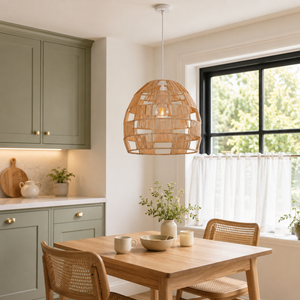 rattan pendant light over a warm kitchen counter
