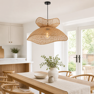 Natural bamboo pendant light above a warm kitchen counter