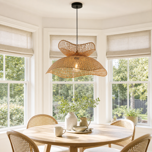 Flower-shaped bamboo pendant in a sunlit dining nook
