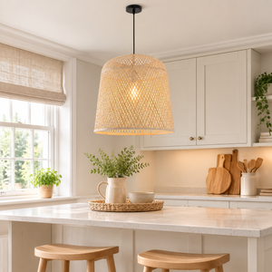 Cylindrical bamboo pendant light over a kitchen table