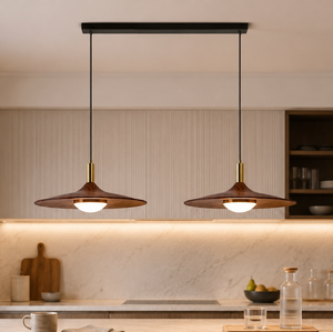 walnut double pendant light pair of walnut linear pendants over a kitchen counter