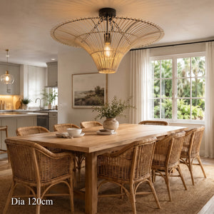 120cm rattan ceiling light above a long wooden dining table