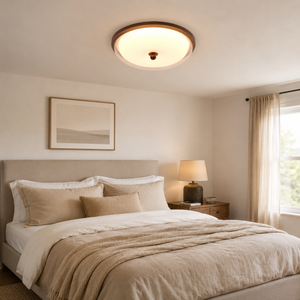walnut acrylic shade ceiling light in a soft neutral bedroom