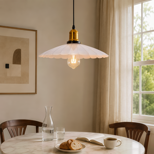 white iron pendant light over a kitchen island