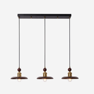 3-light walnut wood mini pendant in a warm living room