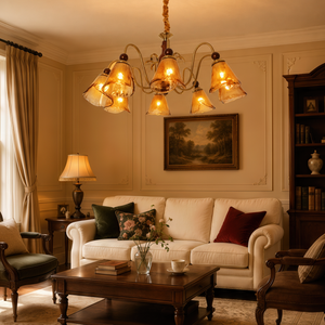 8-light walnut chandelier with amber cut glass shades glowing above a dining table