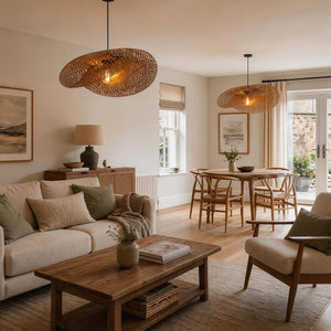 bamboo pendant light above an open-plan living room and dining table