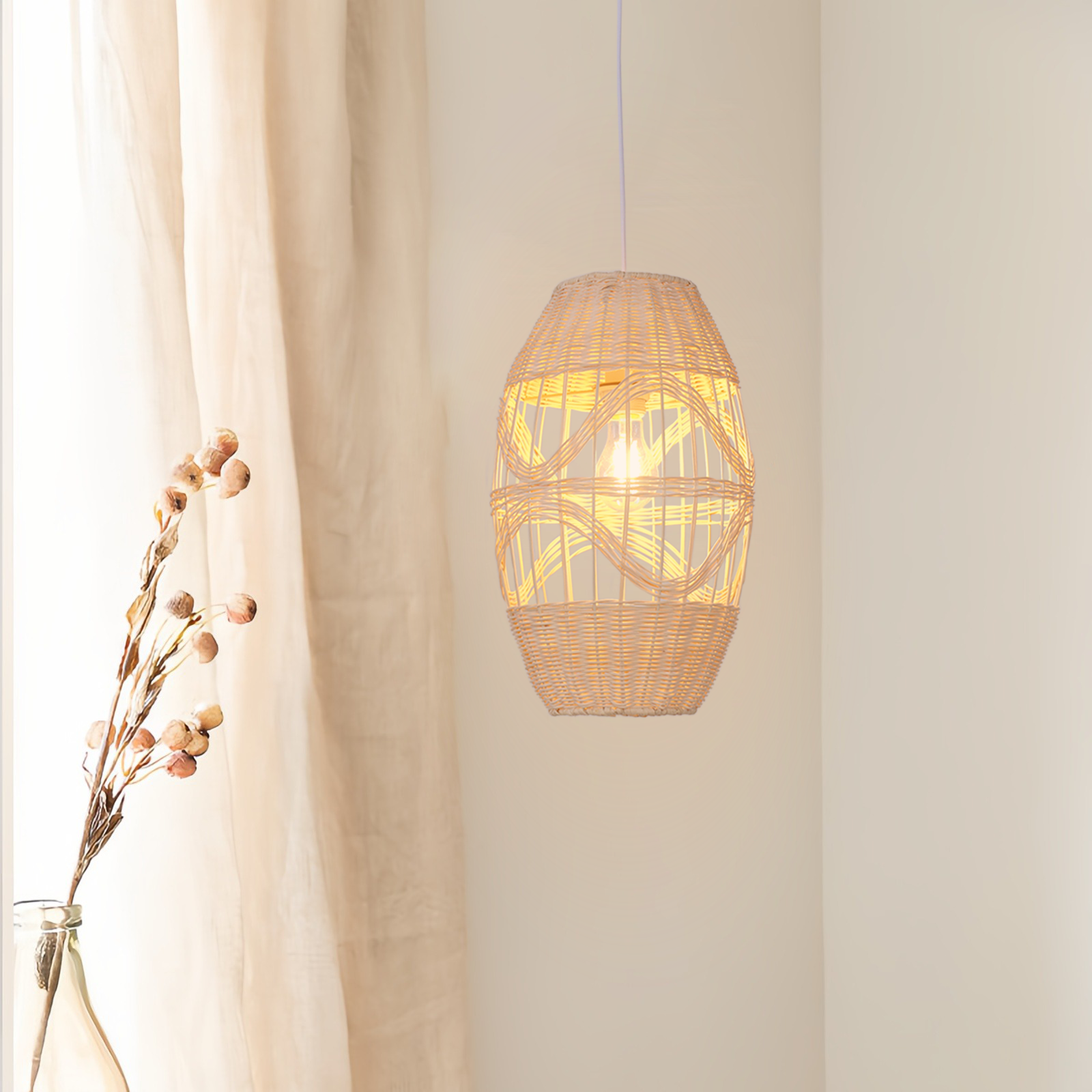 Boho-Chic Handwoven Elongated Oval Rattan Pendant Light