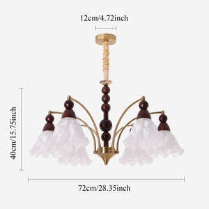 6-light chandelier with white glass shades with close-up glass flower detail