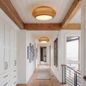 bamboo ceiling lights along a wood beam hallway