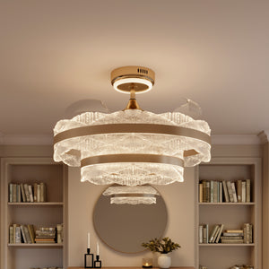 Gold acrylic fan light with layered crystal shade in a living room