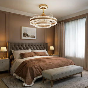 Gold halo ceiling fan light brightening a modern bedroom in neutral white light