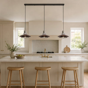 3-light walnut iron bar pendant beside a cosy seating area