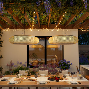 pair of bamboo pendant lights on a covered patio