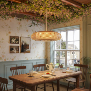 bamboo rattan pendant light in a bright dining room