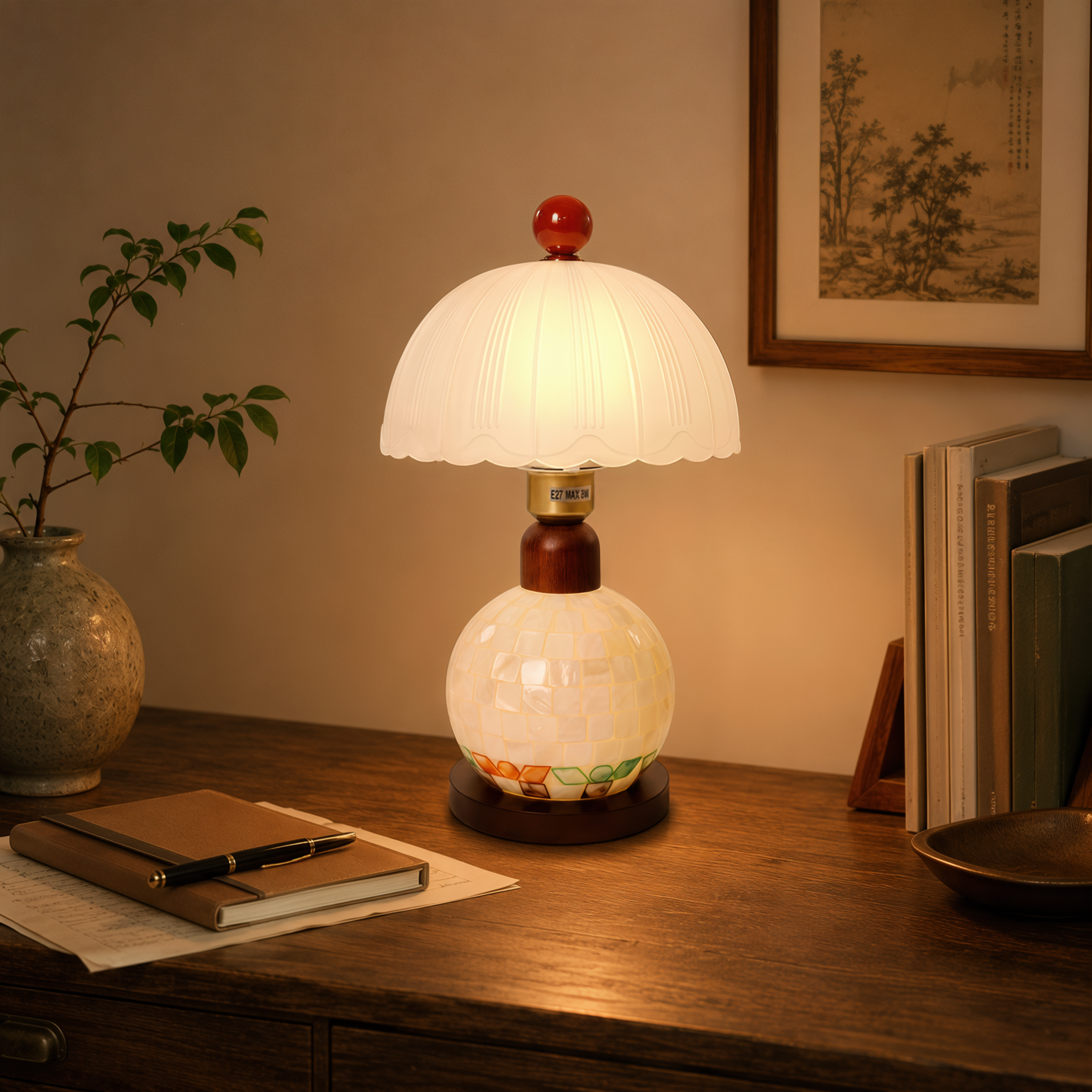 mother-of-pearl mosaic table lamp adding warm light to a bedroom