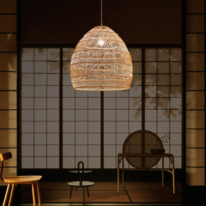 Rattan pendant light glowing in a calm Japanese-style room