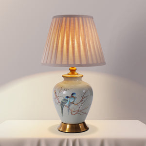 Grey Chinoiserie Hand-Painted Ceramic Table Lamp table lamp shown lit with warm