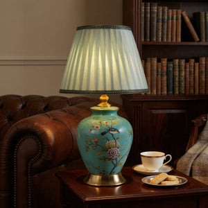 Turquoise Chinoiserie Hand-Painted Ceramic Table Lamp table lamp in a home interior