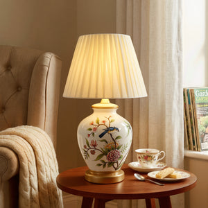 White Chinoiserie Hand-Painted Ceramic Table Lamp table lamp in a home interior
